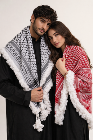 Alhaifawi | Two people wearing traditional Middle Eastern headscarves on a white background