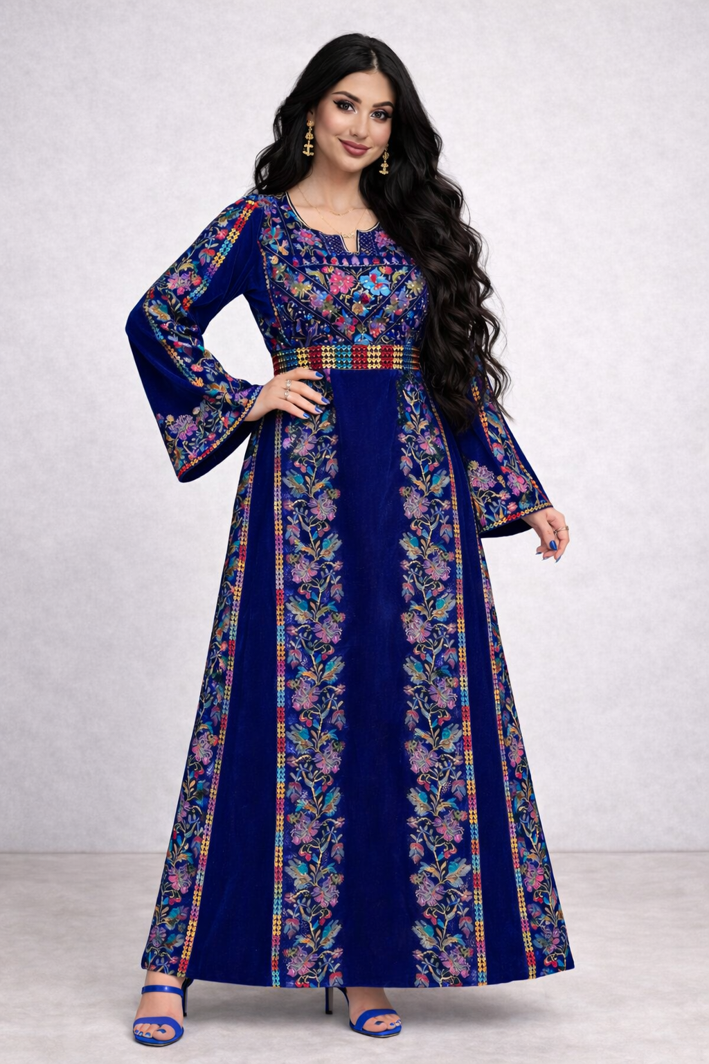 Alhaifawi | Woman wearing a long, floral-patterned dress with bell sleeves against a white background